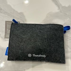 Therabody amenity kit / clutch bag, filled with amazing  travel products